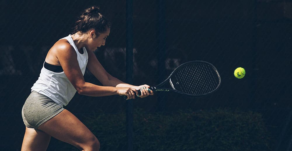 Lady tennis player at Mouratoglou Tennis Centre, Costa Navarino striking a backhand