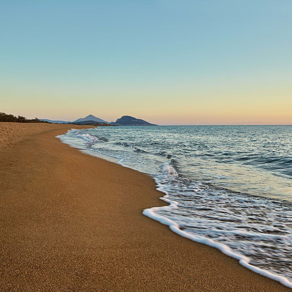 Dunes beach beach with waves and the Ionian Sea